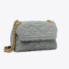 Borsa a tracolla convertibile piccola Fleming in bouclé morbido