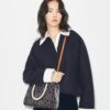 Borsa tote con manici superiori in pelle goffrata a contrasto T Monogram T