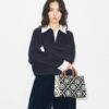 Borsa tote con manici superiori in pelle goffrata a contrasto T Monogram T