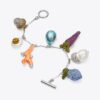 Bracciale con ciondoli a forma di verdure Curiosity Bracciale con ciondoli a forma di verdure Curiosity