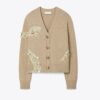 Cardigan con serpente decorato