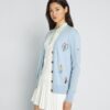 Cardigan da golf ricamato in cashmere Cardigan da golf ricamato in cashmere