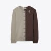 Cardigan in lana con spilla
