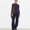 Cardigan in lana con spilla color block