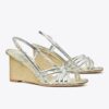 Espadrillas con zeppa e cinturini multipli Espadrillas con zeppa e cinturini multipli