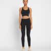 Leggings scolpiti a compressione con tasche laterali Leggings scolpiti a compressione con tasche laterali