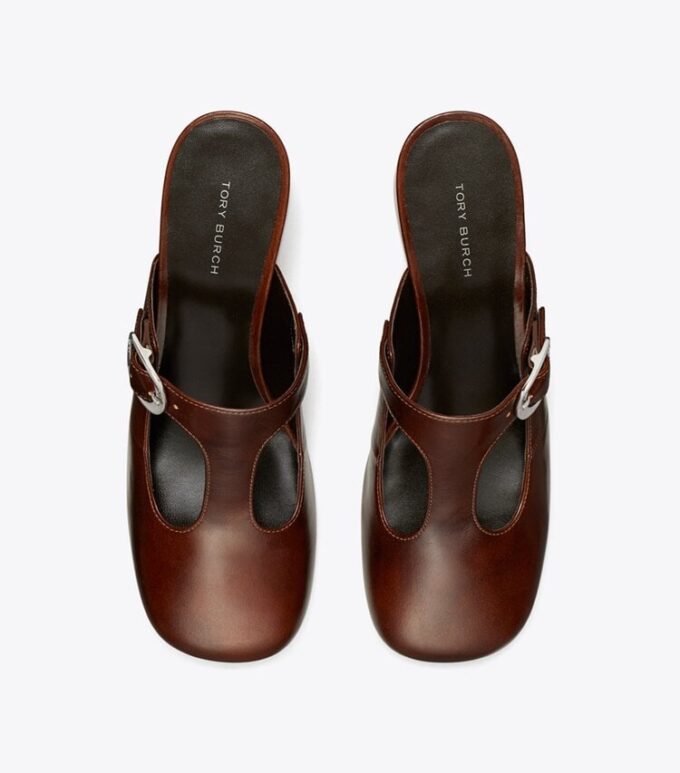 Mule con tacco e cinturino a T viola Mule con tacco e cinturino a T viola