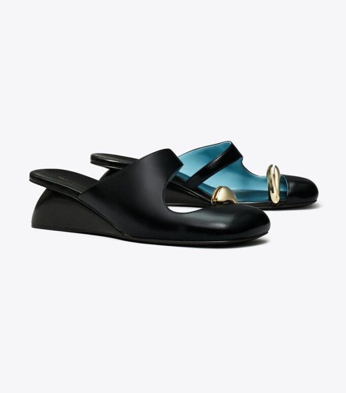 Mule con zeppa traforate Mule con zeppa traforate