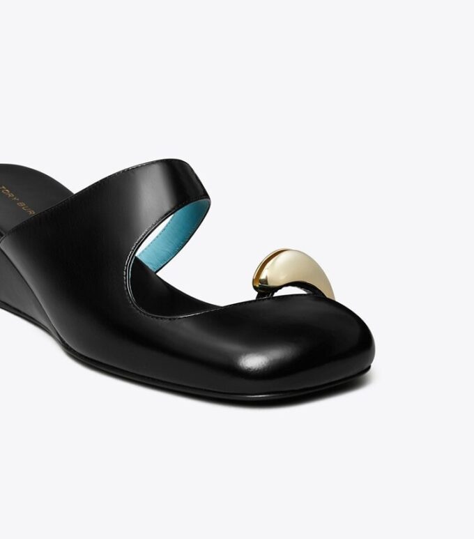 Mule con zeppa traforate Mule con zeppa traforate