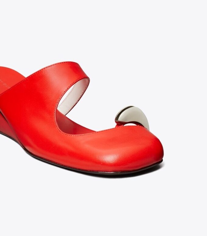 Mule con zeppa traforate Mule con zeppa traforate