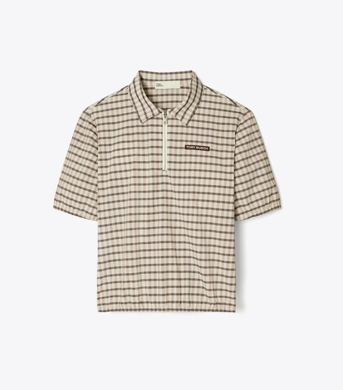 Polo con mezza zip tinta in filo