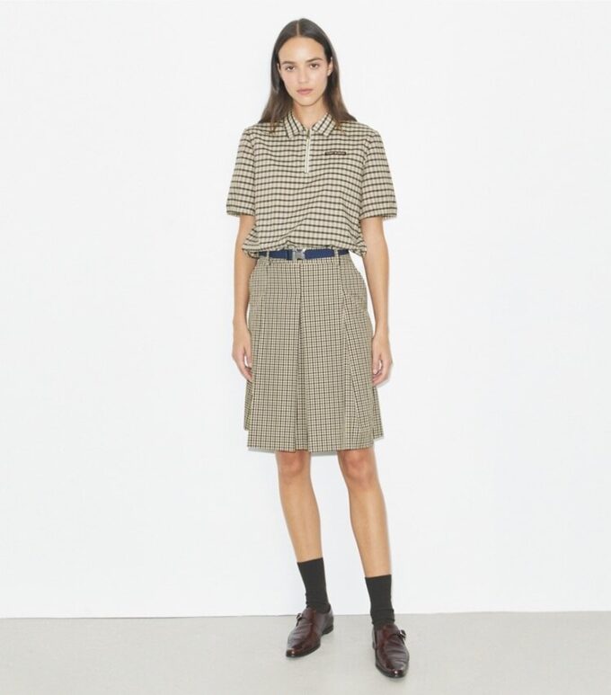 Polo con mezza zip tinta in filo
