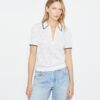 Polo con zip in cotone pointelle T Monogram