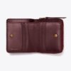 Portafoglio bifold con monogramma T Monogram in vernice goffrata Portafoglio bifold con monogramma T Monogram in vernice goffrata