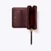 Portafoglio bifold con monogramma T Monogram in vernice goffrata Portafoglio bifold con monogramma T Monogram in vernice goffrata