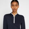 Pullover tecnico con mezza zip