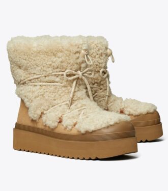 Stivali stringati in shearling morbido