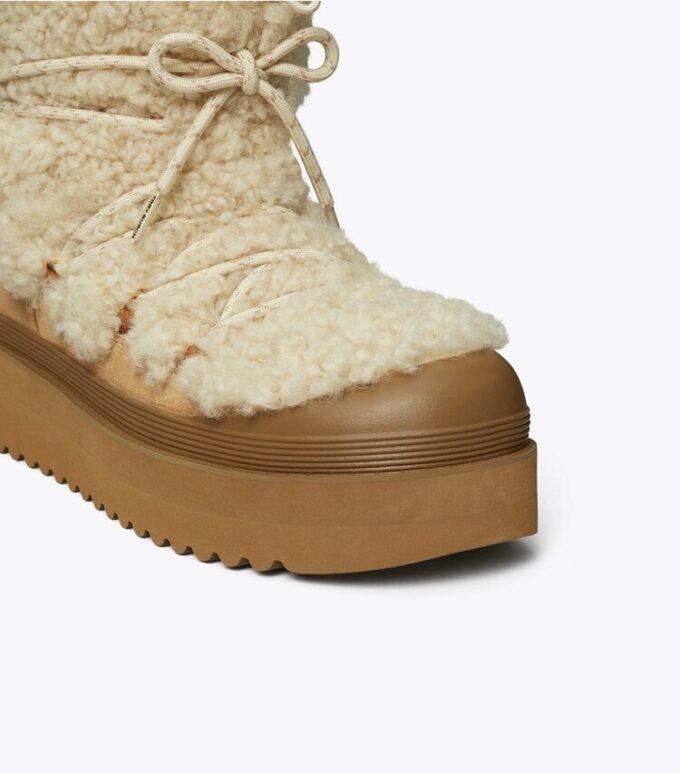 Stivali stringati in shearling morbido