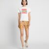 T-shirt con patch con logo grafico T-shirt con patch con logo grafico