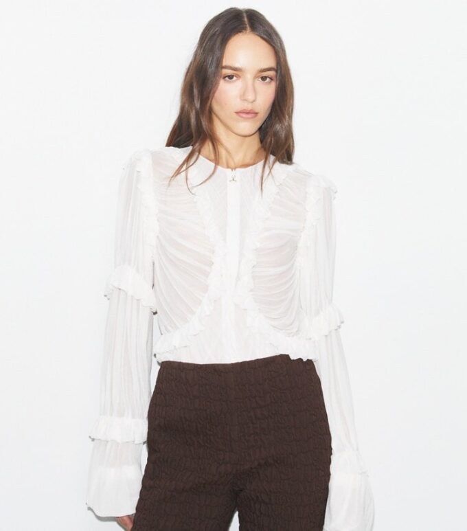 Top con volant in jersey trasparente Top con volant in jersey trasparente