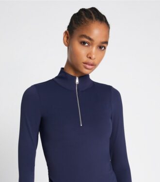 Top corto con mezza zip e maniche lunghe