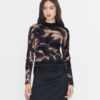 Top in cotone decorato Top in cotone decorato