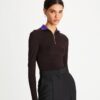 Top in jersey a maniche lunghe con zip frontale