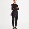 Top in jersey a maniche lunghe con zip frontale